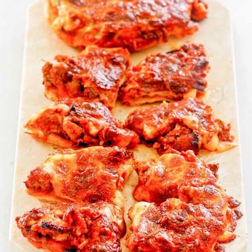 pizza burgers on a marble platter