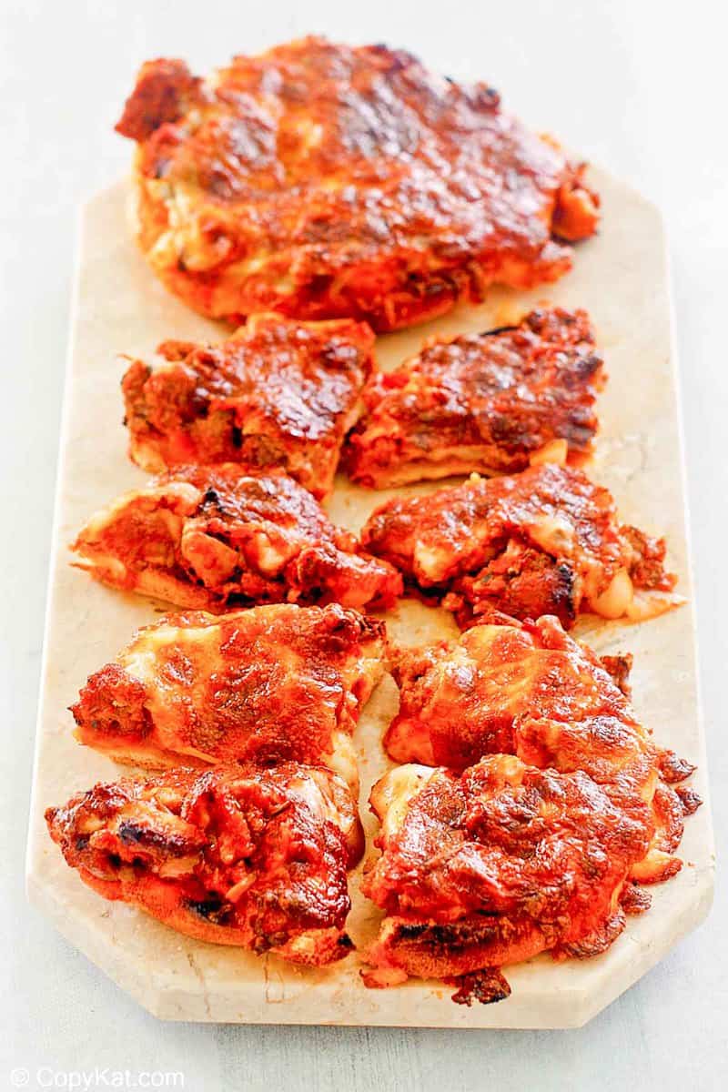 pizza burgers on a marble platter