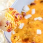 chili cheese dip on a tortilla chip