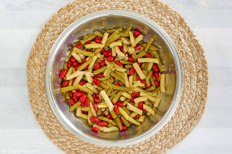 green, red, and wax beans in a bowl