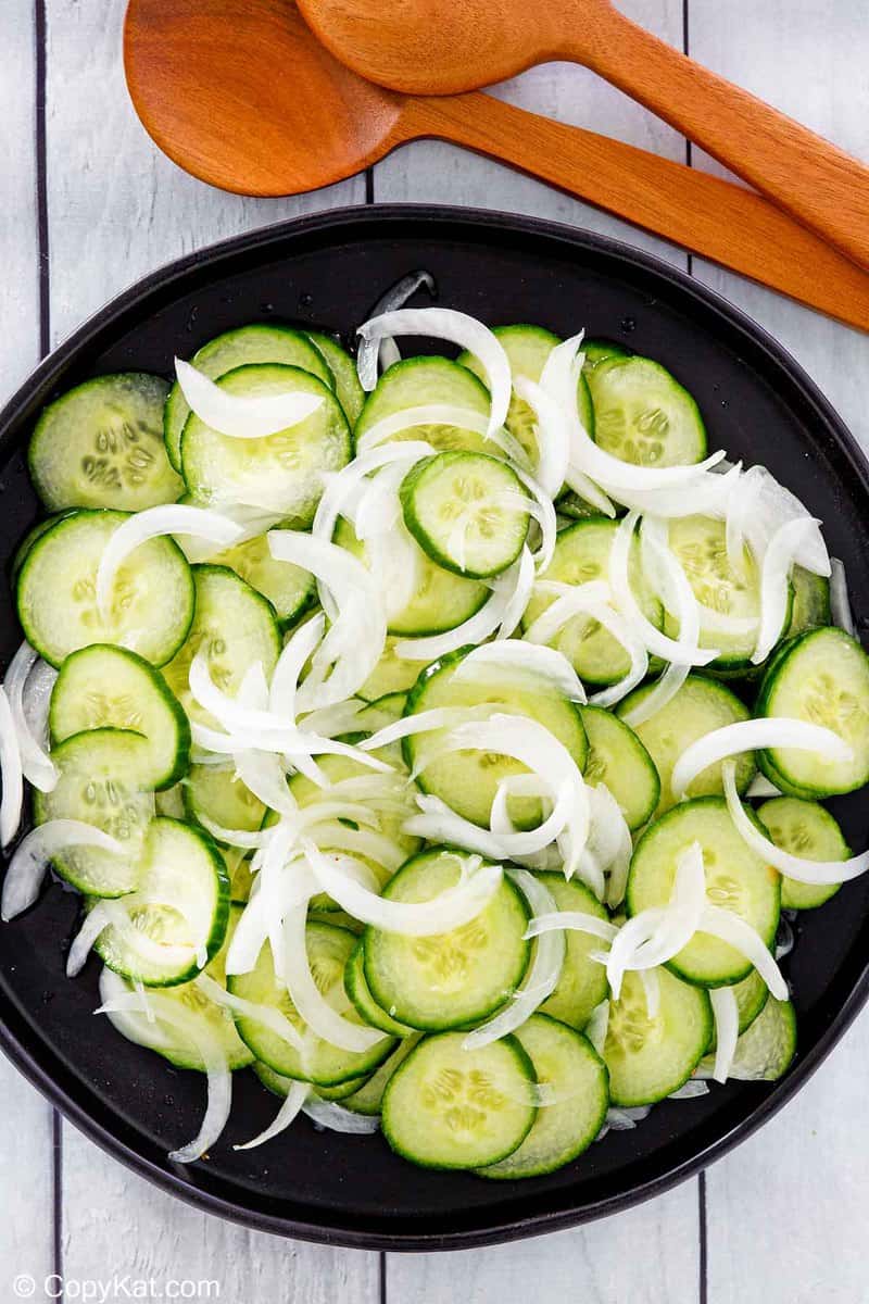 overhead view of cucumber onion salad in a bowl