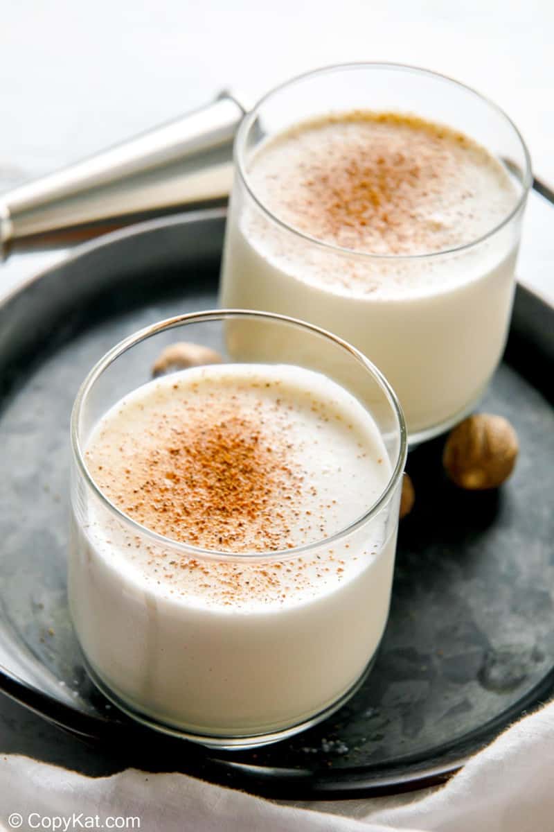 two glasses of milk punch on a tray