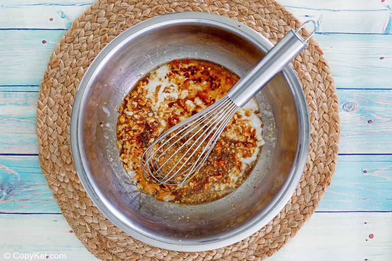 Thai peanut sauce ingredients in a mixing bowl.