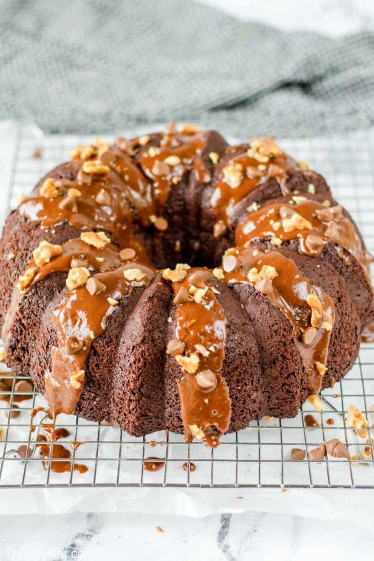 glazed chocolate bundt cake on a wire rack.
