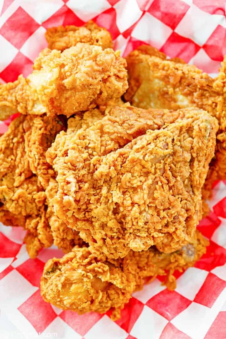 overhead view of homemade KFC fried chicken on parchment paper