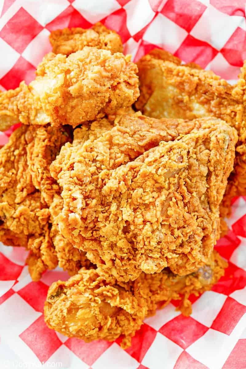 overhead view of homemade KFC fried chicken on parchment paper