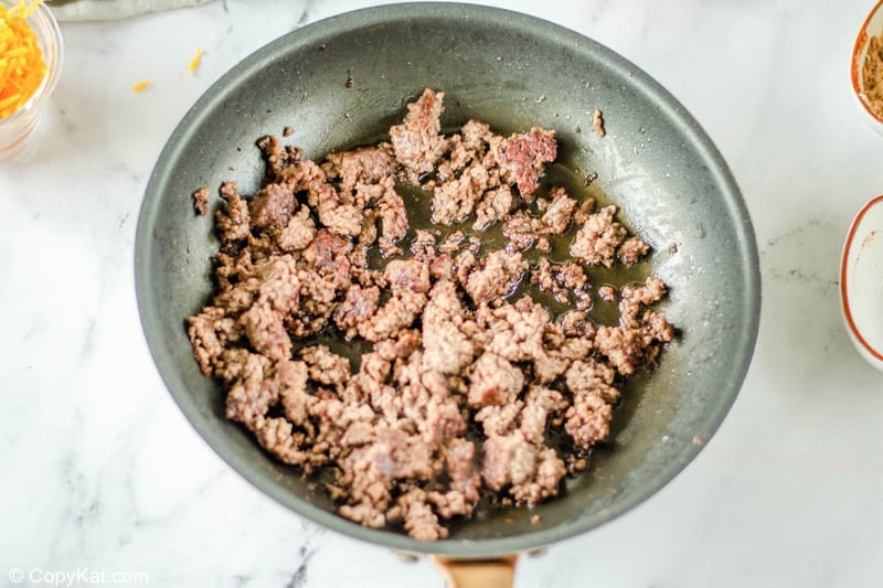 browned ground beef in a skillet
