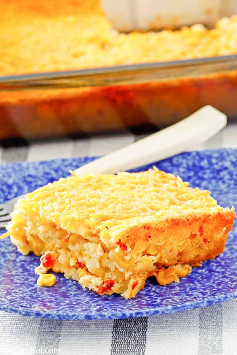 creamed corn casserole in a baking dish and on a plate