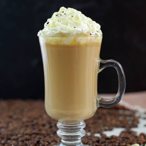 homemade Starbucks white chocolate mocha and coffee beans.