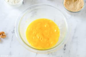 beaten eggs in a mixing bowl