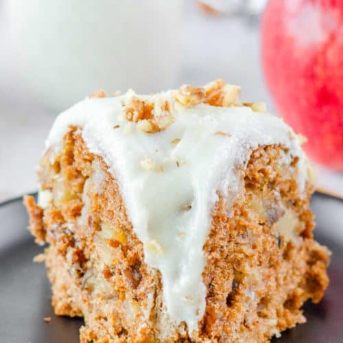 a slice of apple spice bundt cake on a plate.