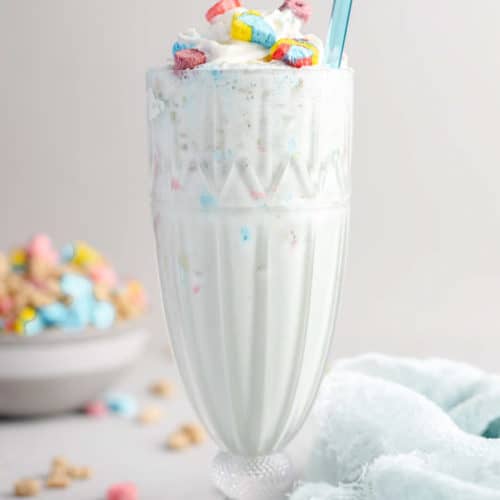 homemade Burger King Lucky Charms milkshake and a blue kitchen towel.