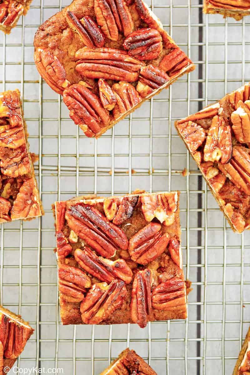 overhead view of pecan pie brownies on a wire rack.