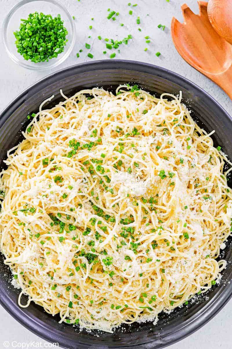overhead view of garlic butter pasta in a serving bowl.