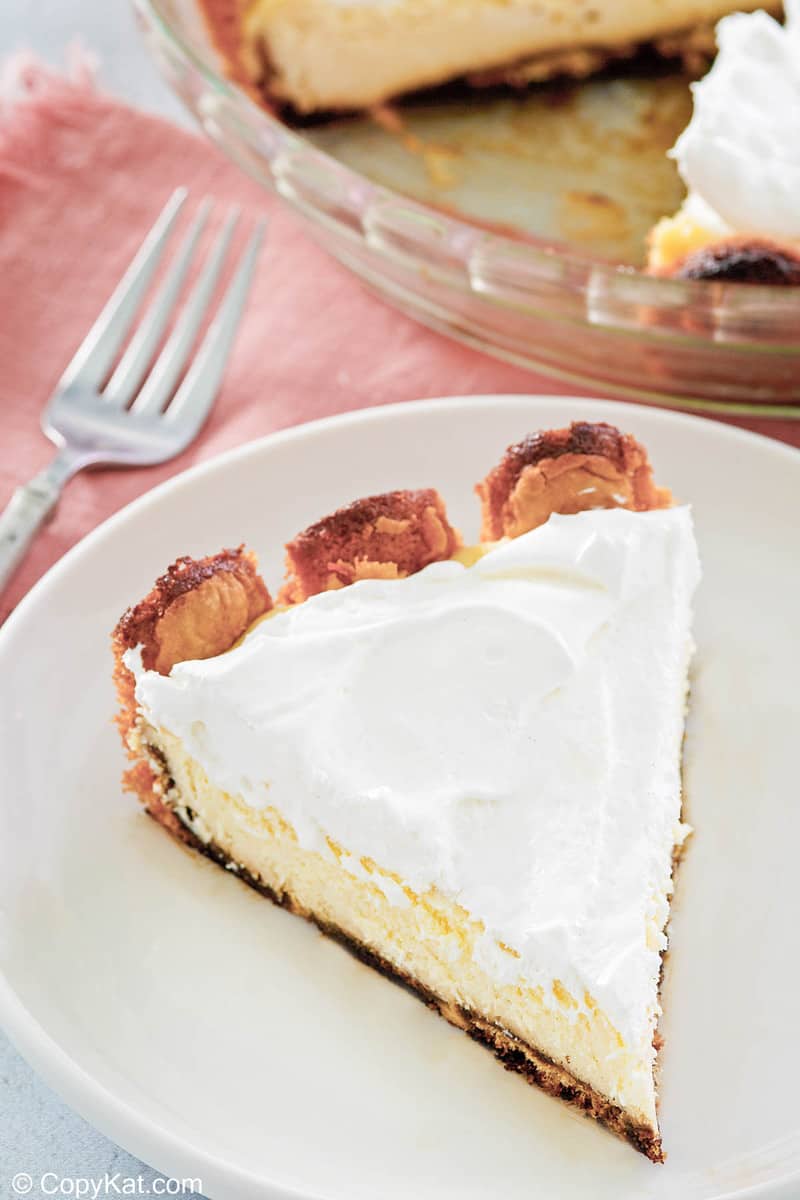tiramisu cheesecake slice on a plate.
