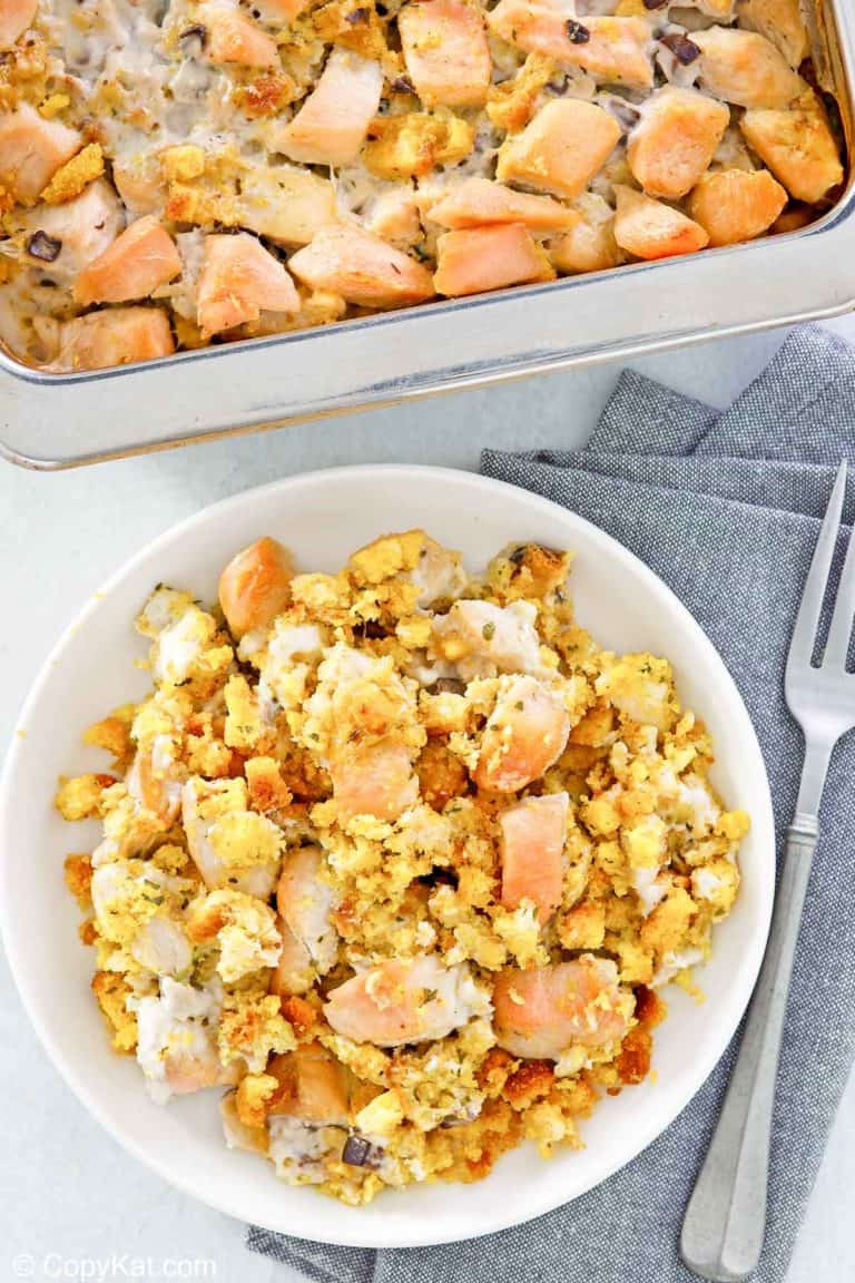 overhead view of chicken and dressing casserole in a baking dish and on a plate.