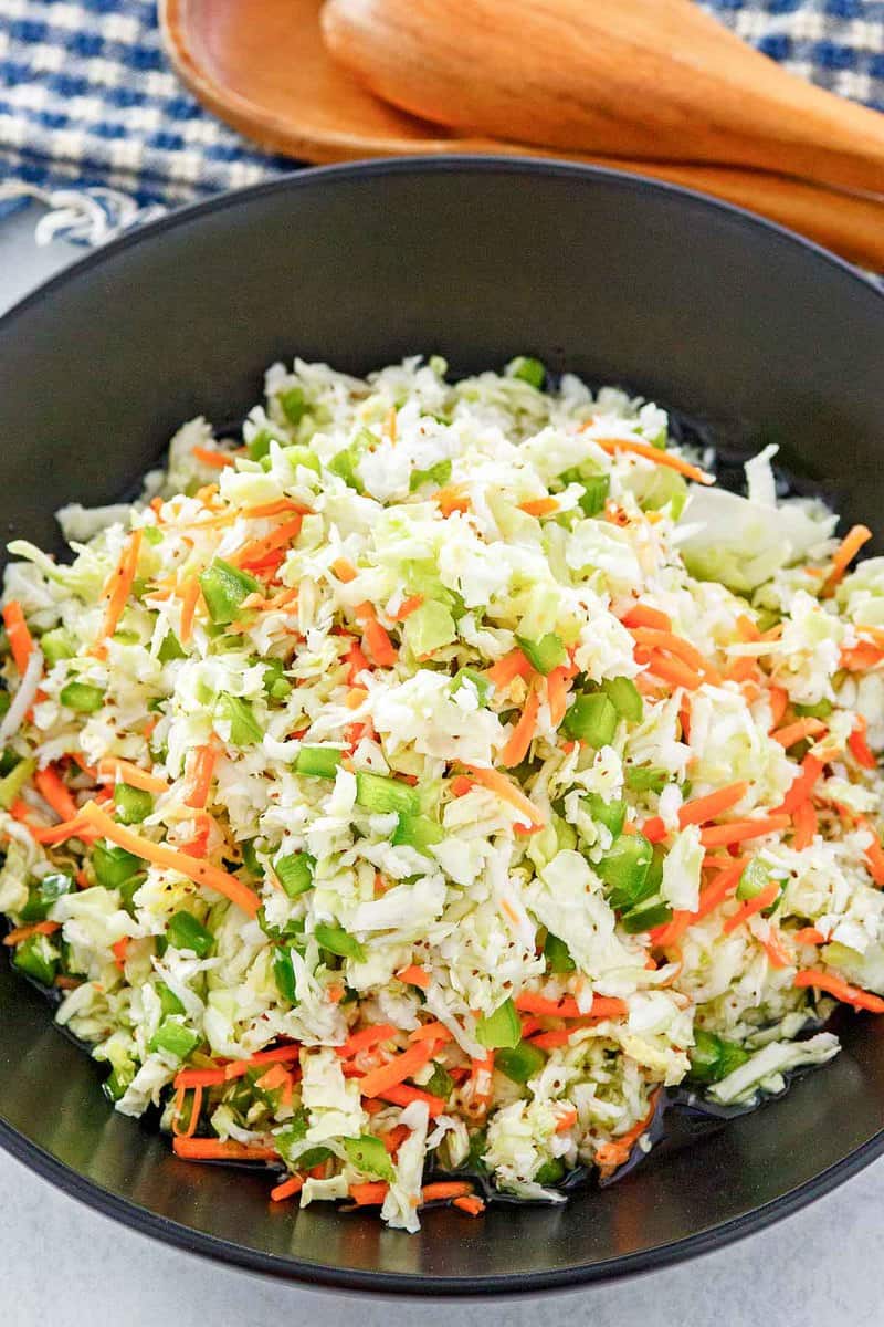 freezer slaw in a black bowl.