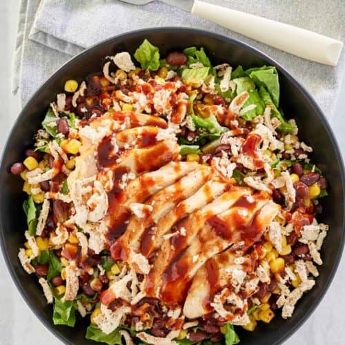 overhead view of copycat Panera BBQ chicken salad and a fork on a napkin.