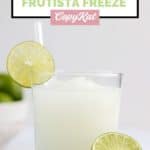homemade Taco Bell pina colada frutista freeze and a lime.