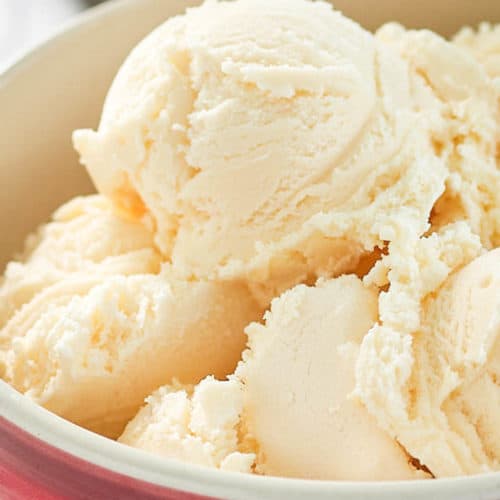 homemade French vanilla ice cream in a colorful bowl.