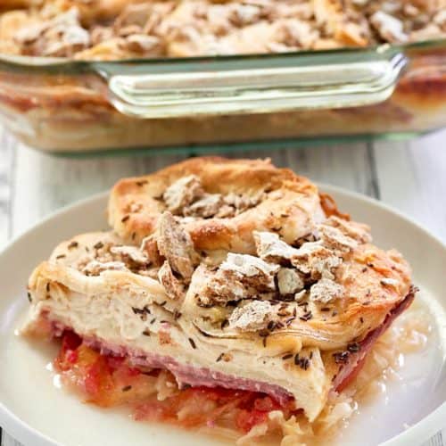 reuben casserole on a plate in front of the casserole dish.