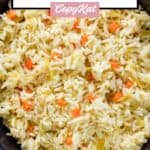 overhead view of homemade rice pilaf in a black bowl.