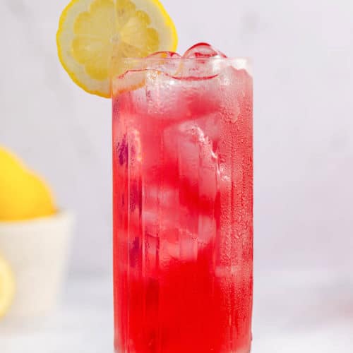 copycat Starbucks passion tea lemonade drink on a coaster.