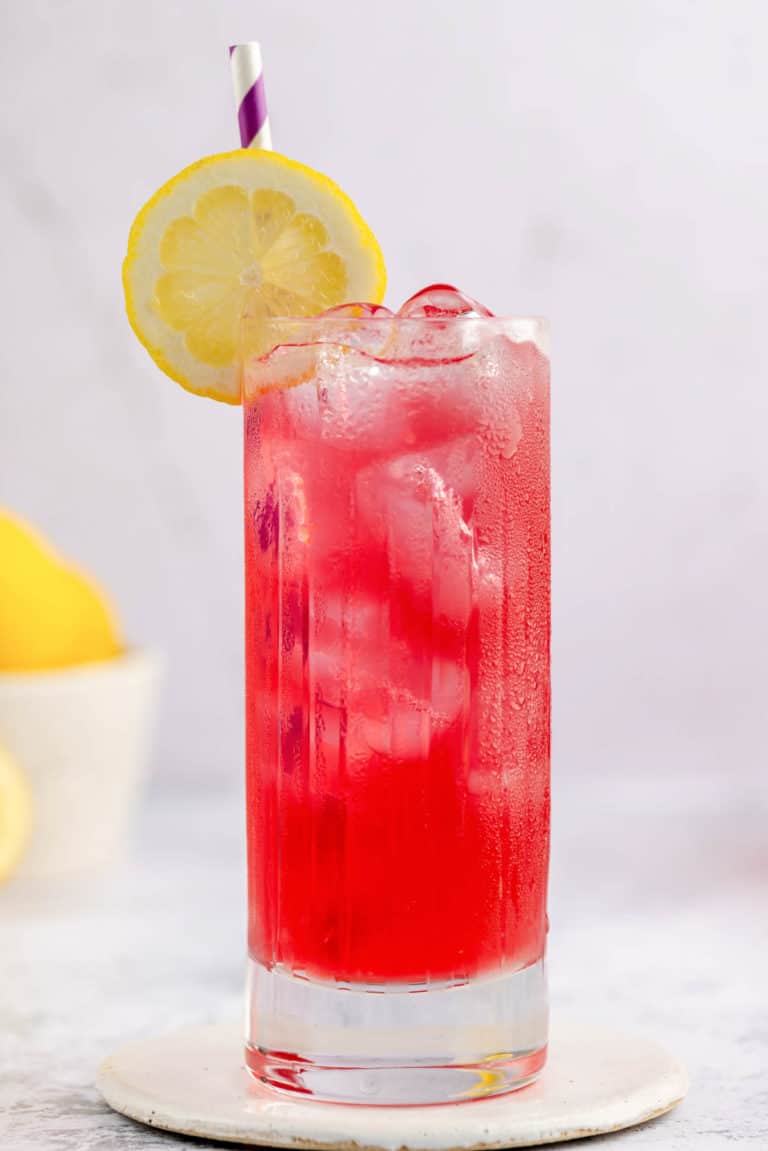 copycat Starbucks passion tea lemonade drink on a coaster.