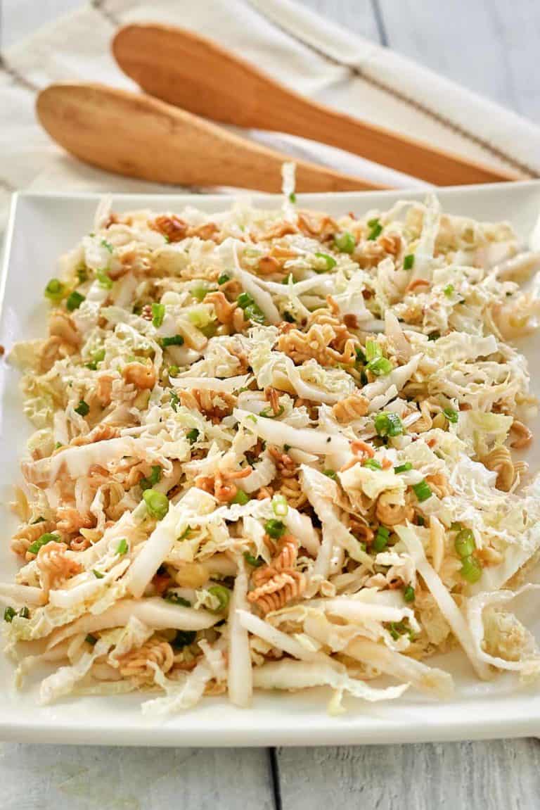 Asian slaw with ramen noodles on a platter.