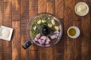 horseradish herb sauce ingredients in a food processor.