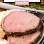 slices of smoked eye of round roast on a plate.