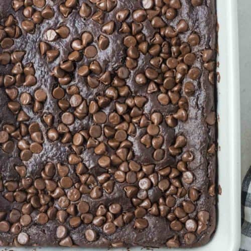overhead view of chocolate pudding cake with chocolate chips.
