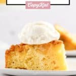slice of pineapple upside down cake on a plate.