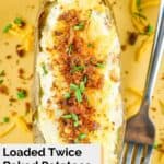 overhead view of a loaded twice baked potato.