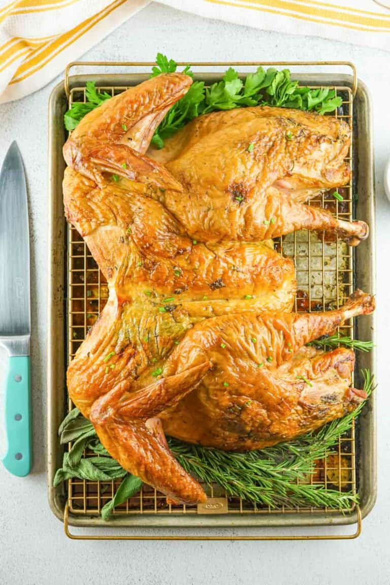 overhead view of a smoked spatchcock turkey.