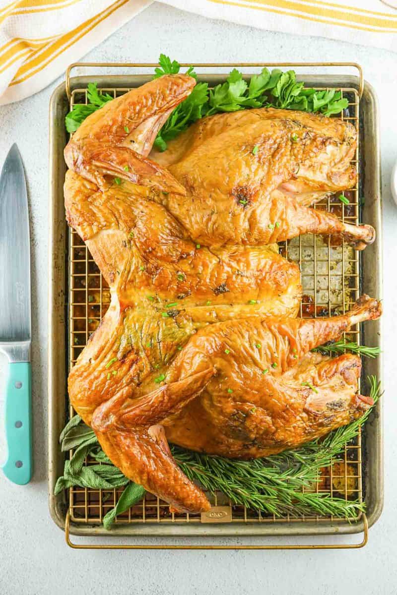overhead view of a smoked spatchcock turkey.