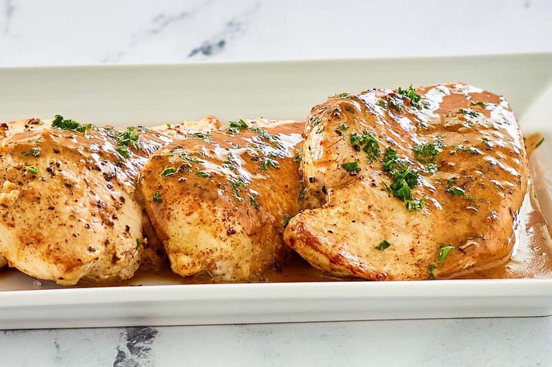 chicken dijon and mustard sauce on a platter.