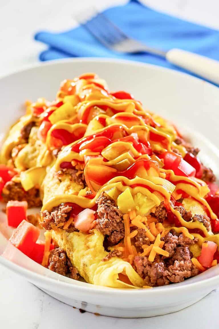 copycat IHOP cheeseburger omelette on a white plate.