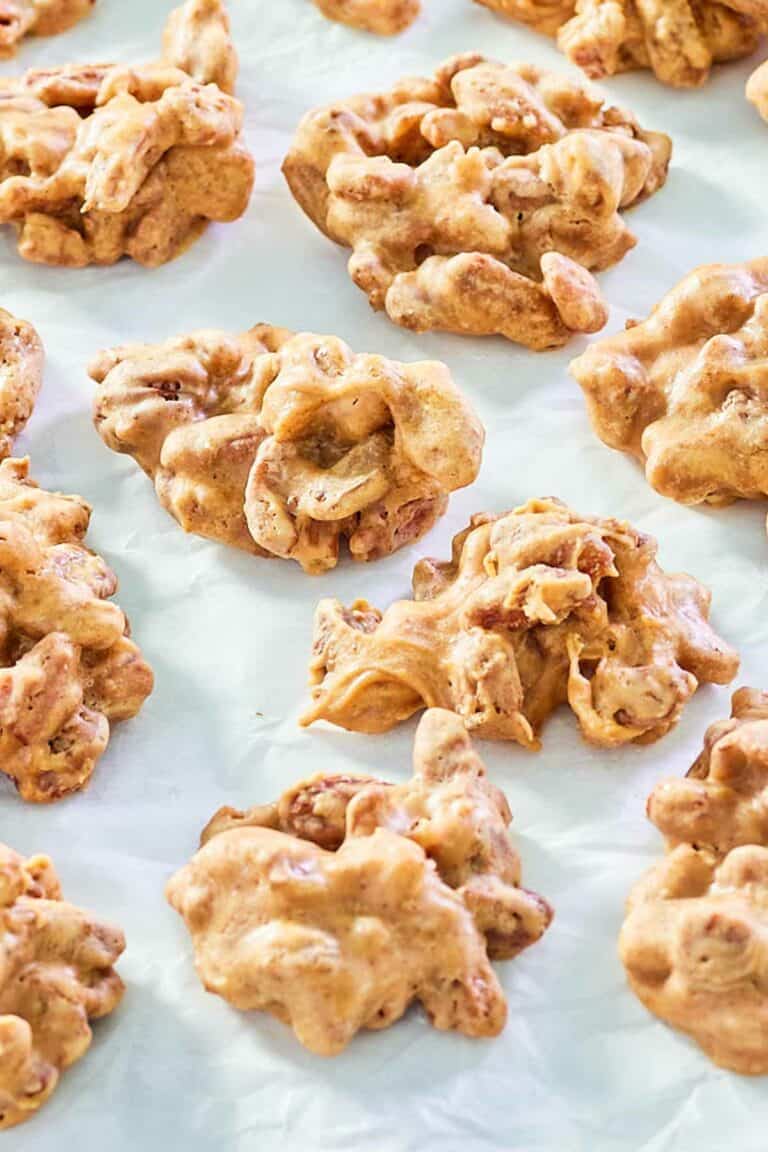 homemade pecan pralines on parchment paper.