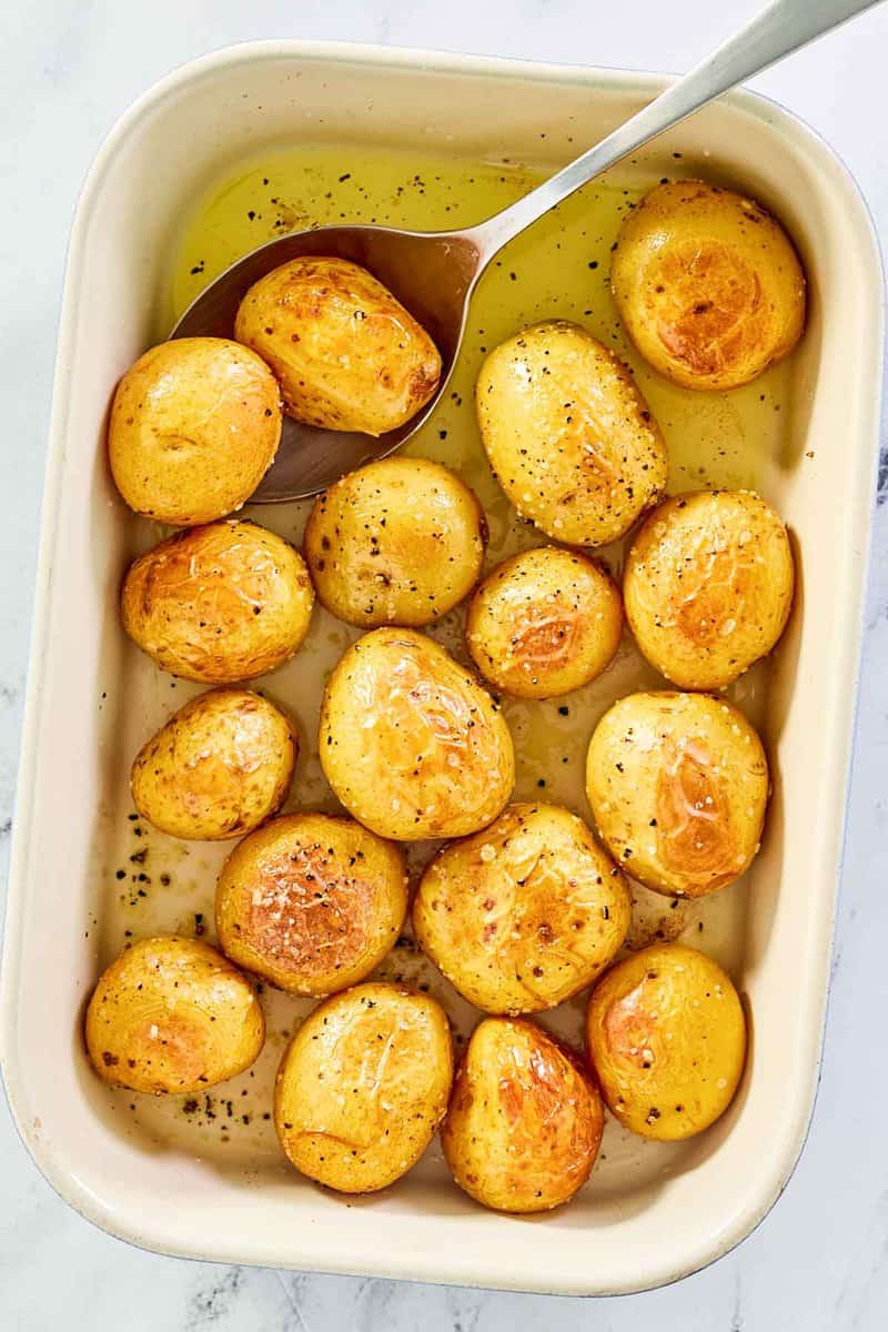 overhead view of roasted baby potatoes in a dish.