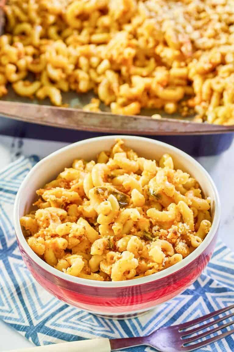 spicy mac and cheese in a bowl and baking dish.