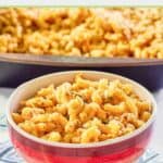 serving of spicy macaroni and cheese in a striped bowl.