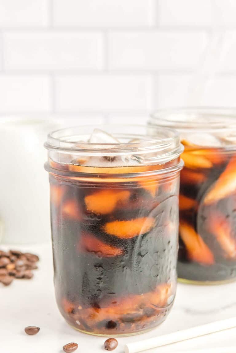 copycat Starbucks cold brew coffee with ice in a mason jar.