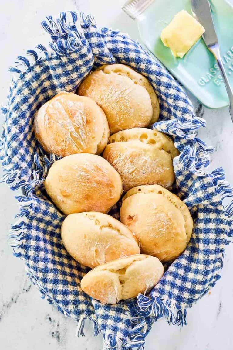 Overhead view of angel biscuits in a basket.