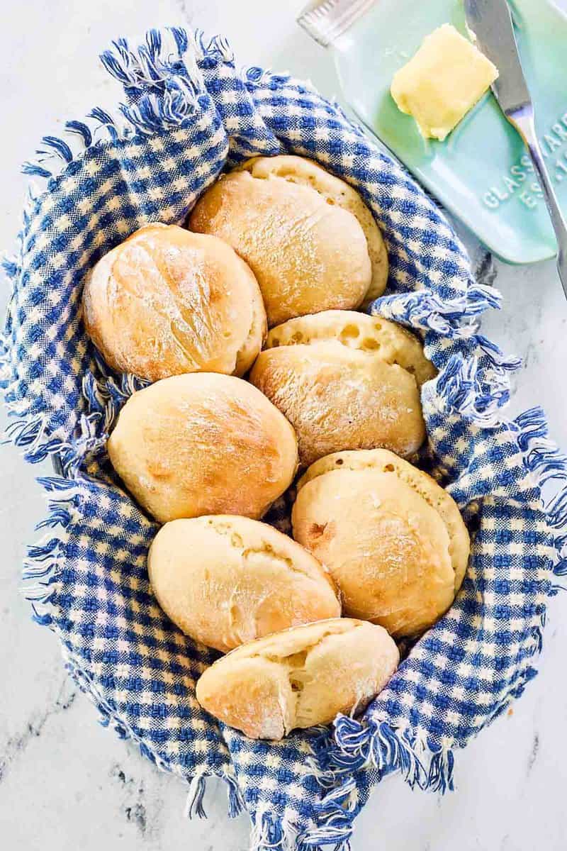 Overhead view of angel biscuits in a basket.
