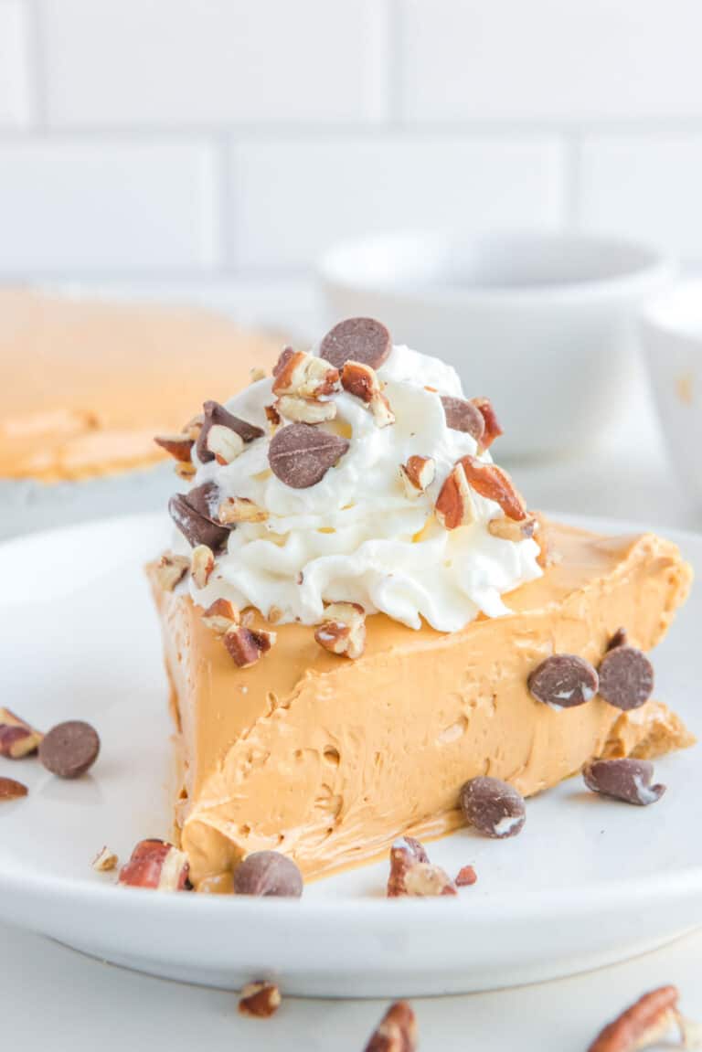 A slice of copycat O'Charley's caramel pie on a plate.