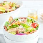 A serving of homemade Panera fuji apple salad in a bowl.