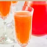 Strawberry mimosa in a champagne flute.