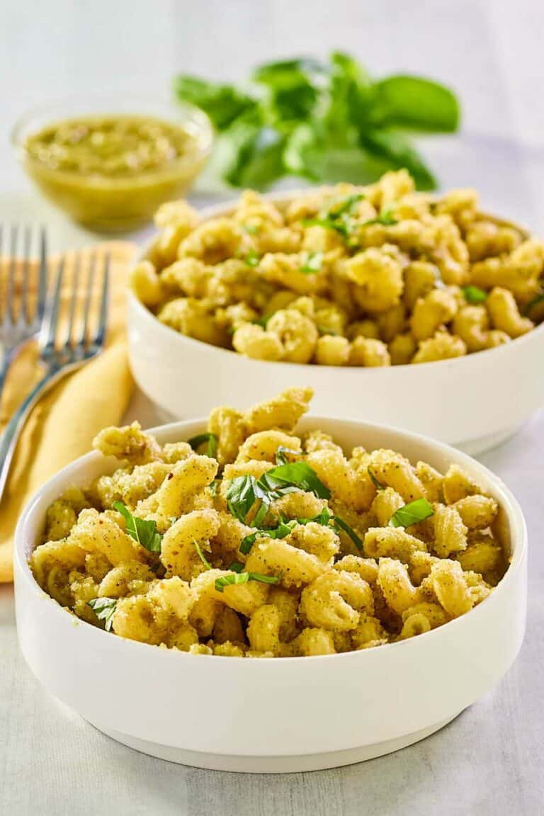 Two bowls of copycat Alonti pecan pesto pasta.