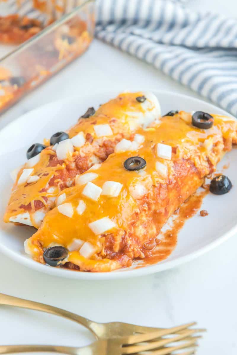Two copycat Taco Bell enchiritos on a plate.